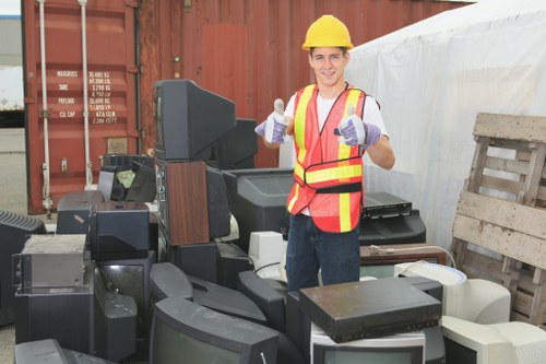 Professionals assessing skip hire services in Cranford